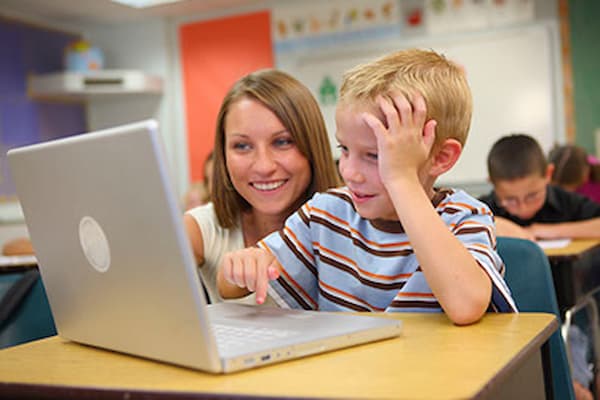 Teacher child in classroom