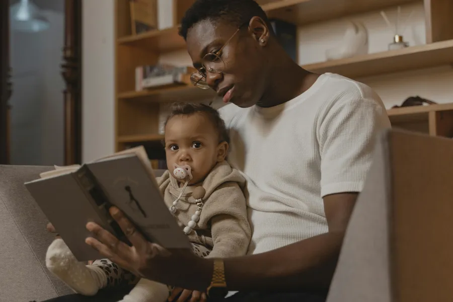 Father interacting with baby during hearing study