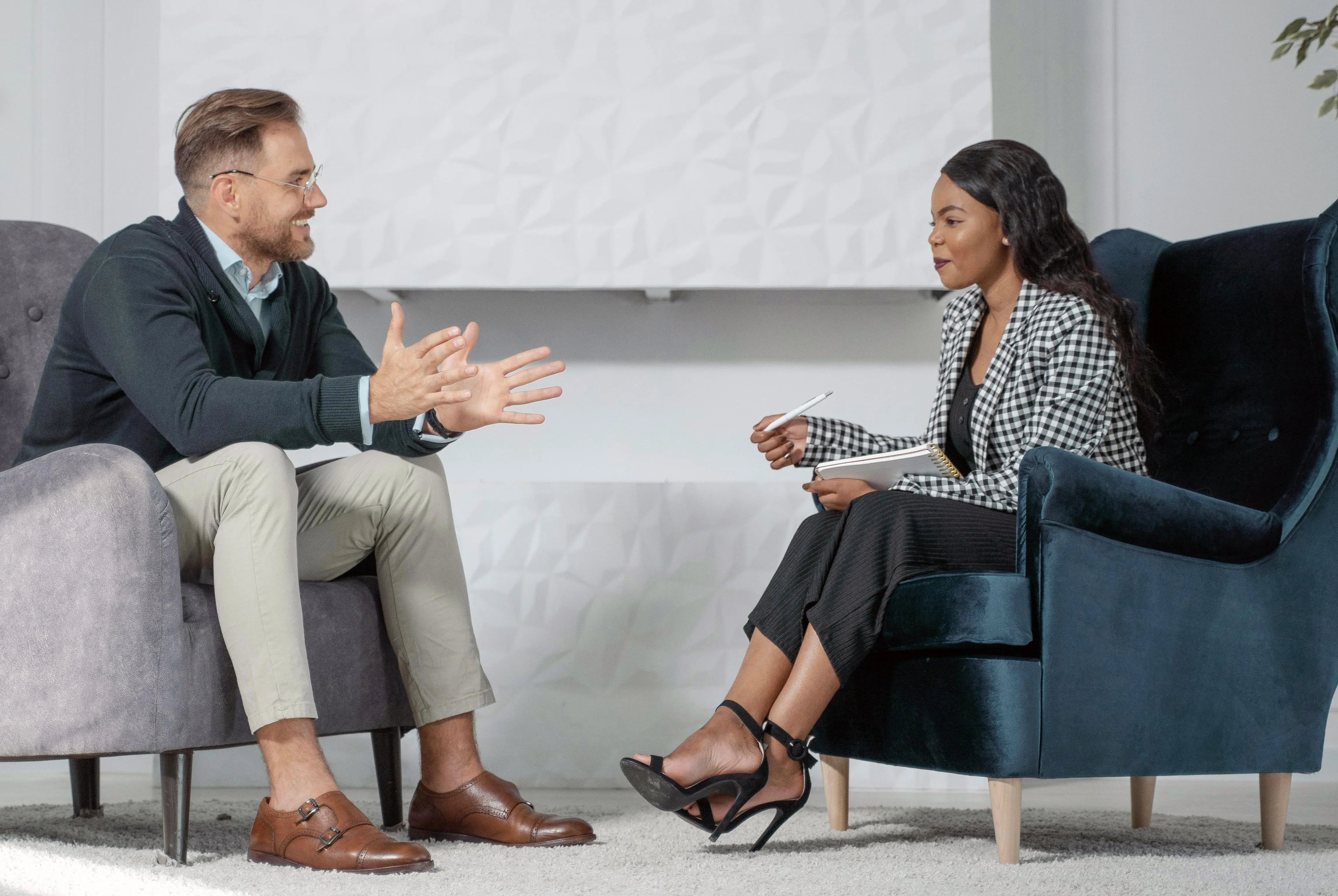 Coach and client in a coaching session discussing strategy