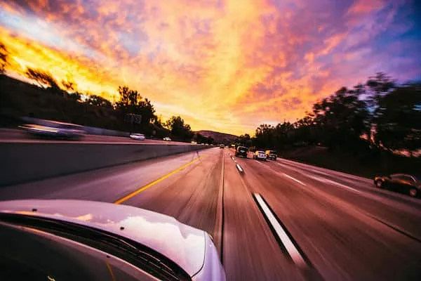 Car driving on a highway for human factors automotive systems testing