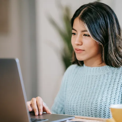 User behing a laptop