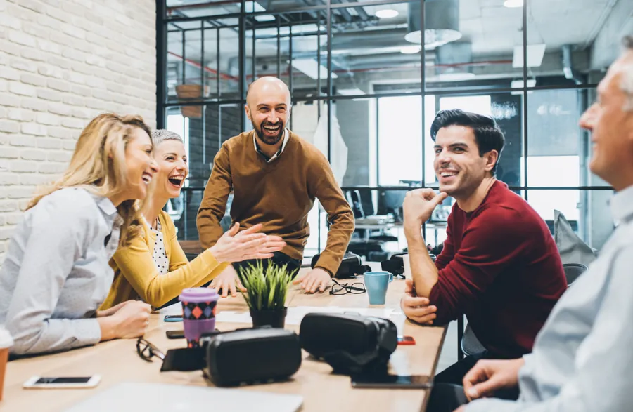 Team meeting showing positive interaction and humor